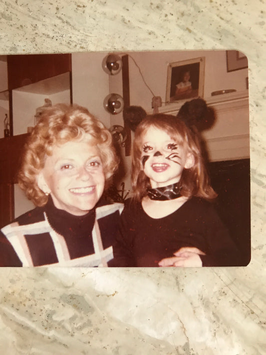 printed photo of grandmother and granddaughter
