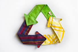 Sustainable Fashion Reduce Reuse Recycle Symbol Made with Fabric